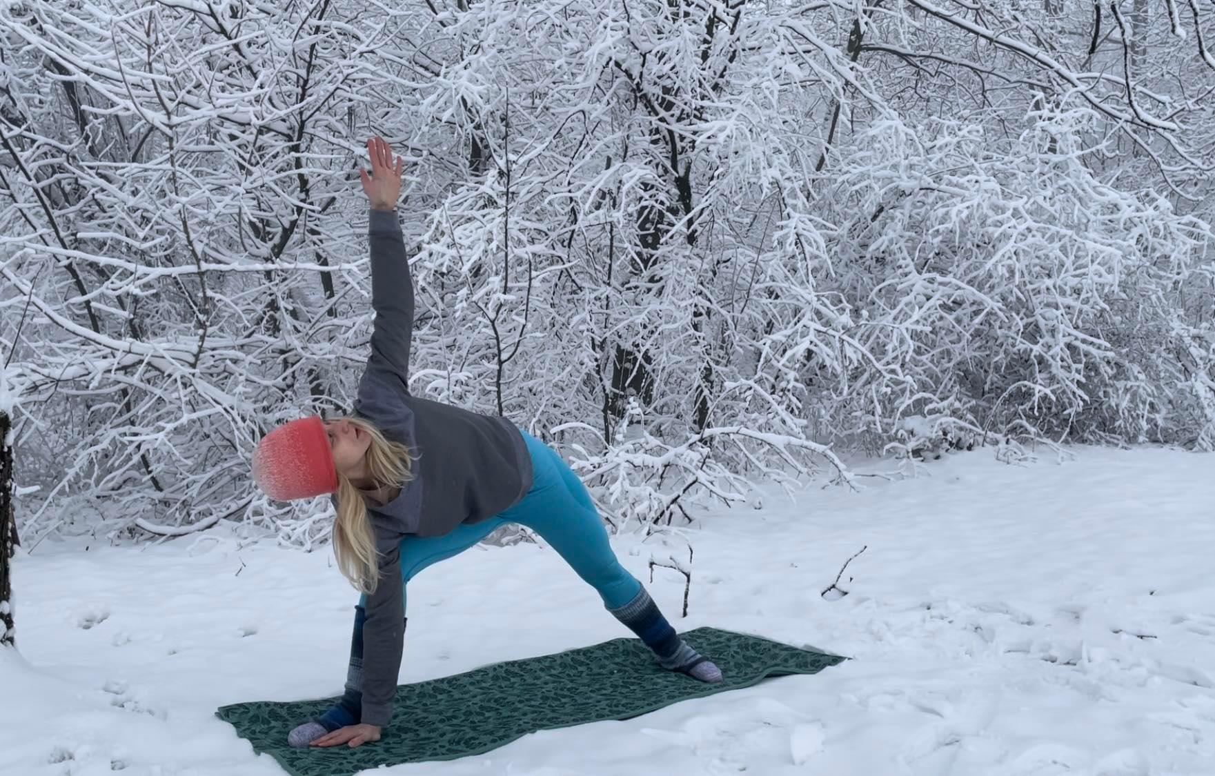 Triangle pose in the snow
