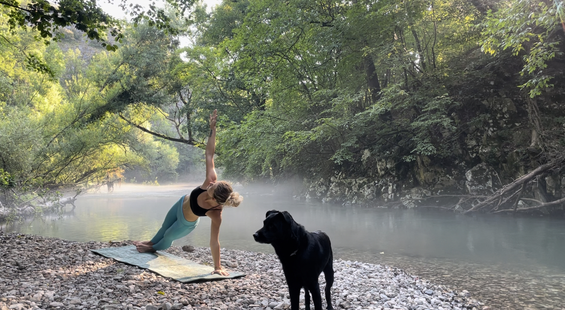 Triangle pose by the river