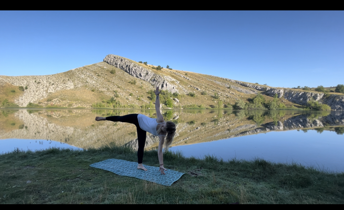 Half moon pose by the lake