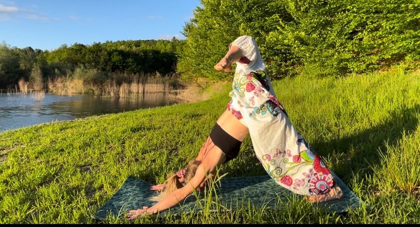 Backbend by the lake